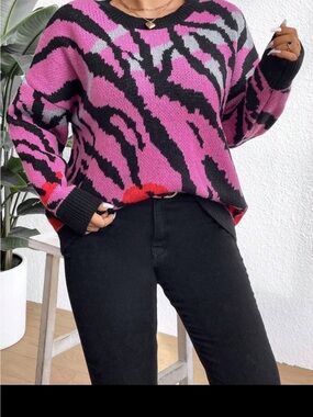 Pink animal print sweater